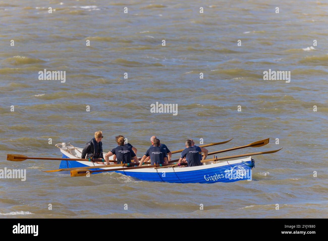 Pilot gig racing off Clevedon beach Stock Photo - Alamy