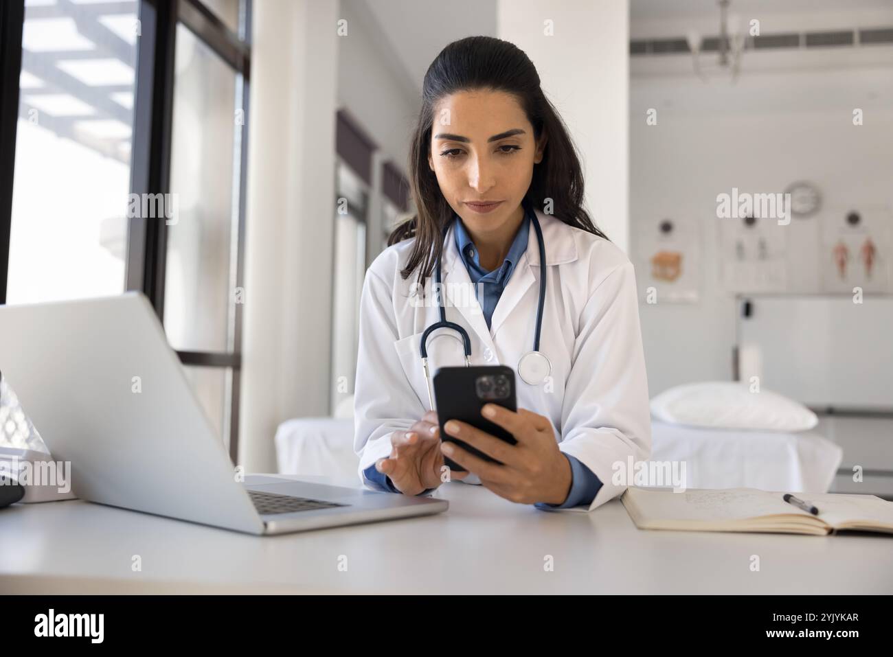Female therapist typing laptop hi-res stock photography and images - Alamy
