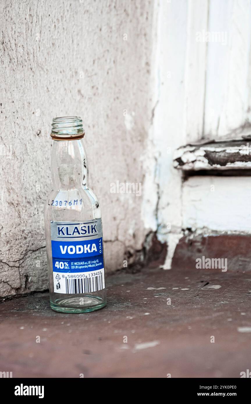Vodka Empty an empty vodka bottle left on a window sill Stock Photo - Alamy