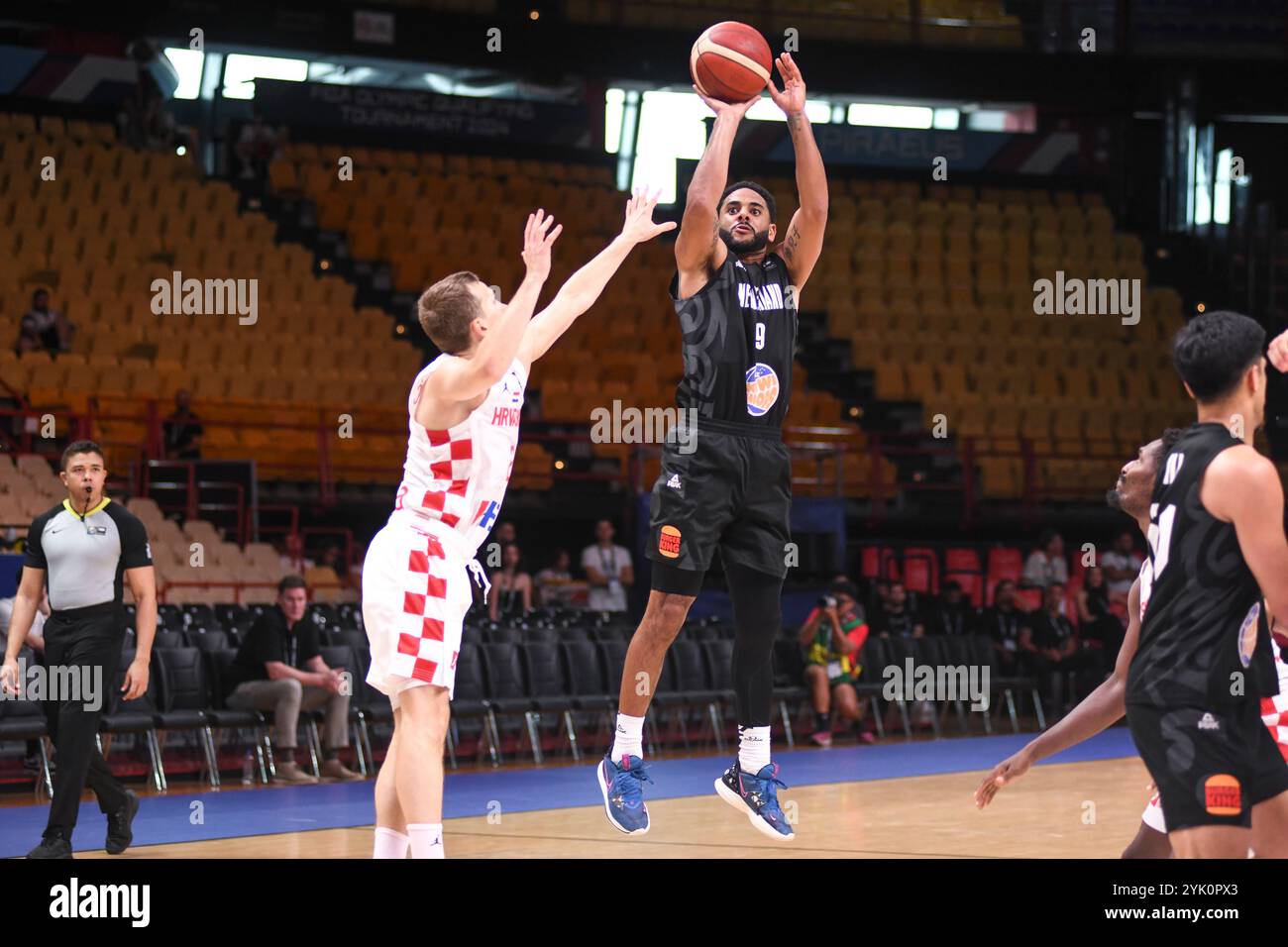 Corey Webster (New Zealand) against Croatia. FIBA Olympic Qualifying Tournament. Piraeus 2024. Stock Photo