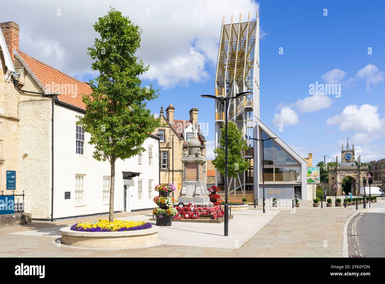 Bishop Auckland War memorial with the Auckland Tower at the Auckland Project in Bishop Auckland County Durham Tees Valley England UK GB Europe Stock Photo