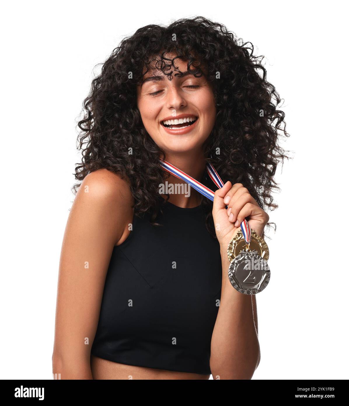 Happy winner with different medals on white background Stock Photo - Alamy