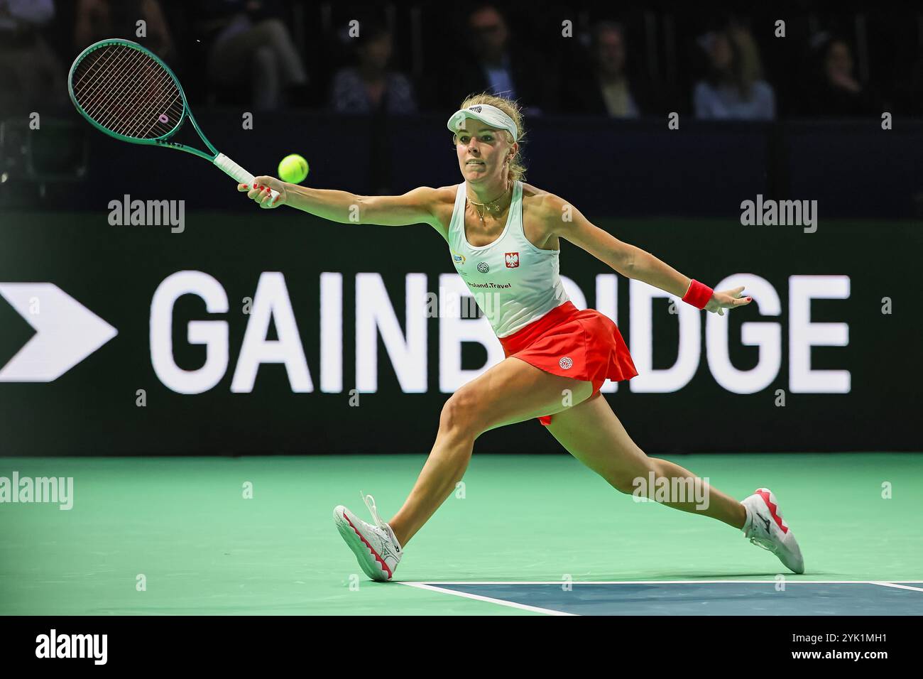 Malaga, Malaga, Spain. 16th Nov, 2024. Magdalena Frech of Poland, returns with forehand against Marie Bouzkova of Czechia during the 2024 Billie Jean King Cup Finals - Womens Tennis (Credit Image: © Mathias Schulz/ZUMA Press Wire) EDITORIAL USAGE ONLY! Not for Commercial USAGE! Stock Photo