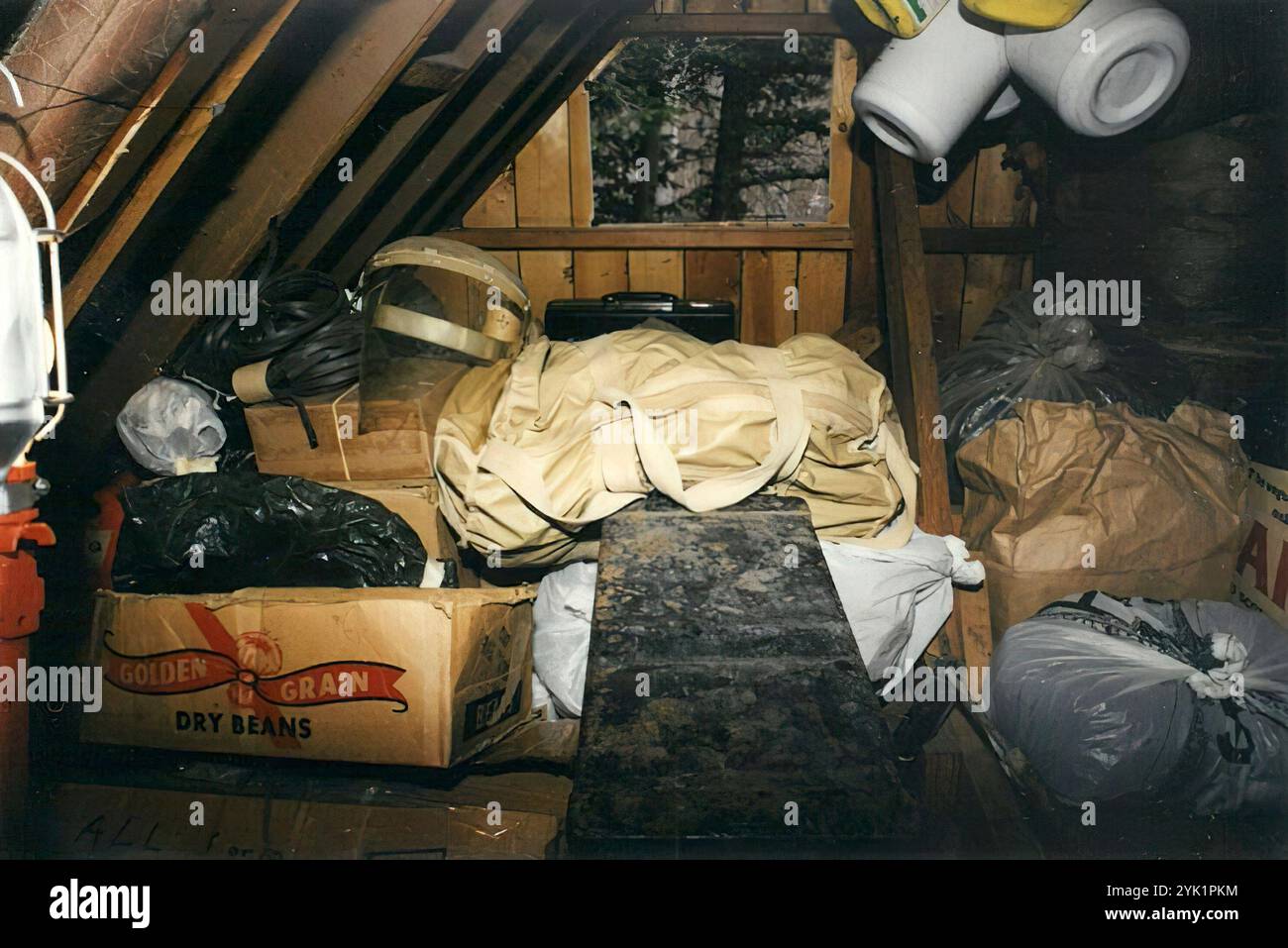 A face shield, left, can be seen among the items in Unabomber Ted Kaczynski's cabin in this FBI evidence photo. Stock Photo