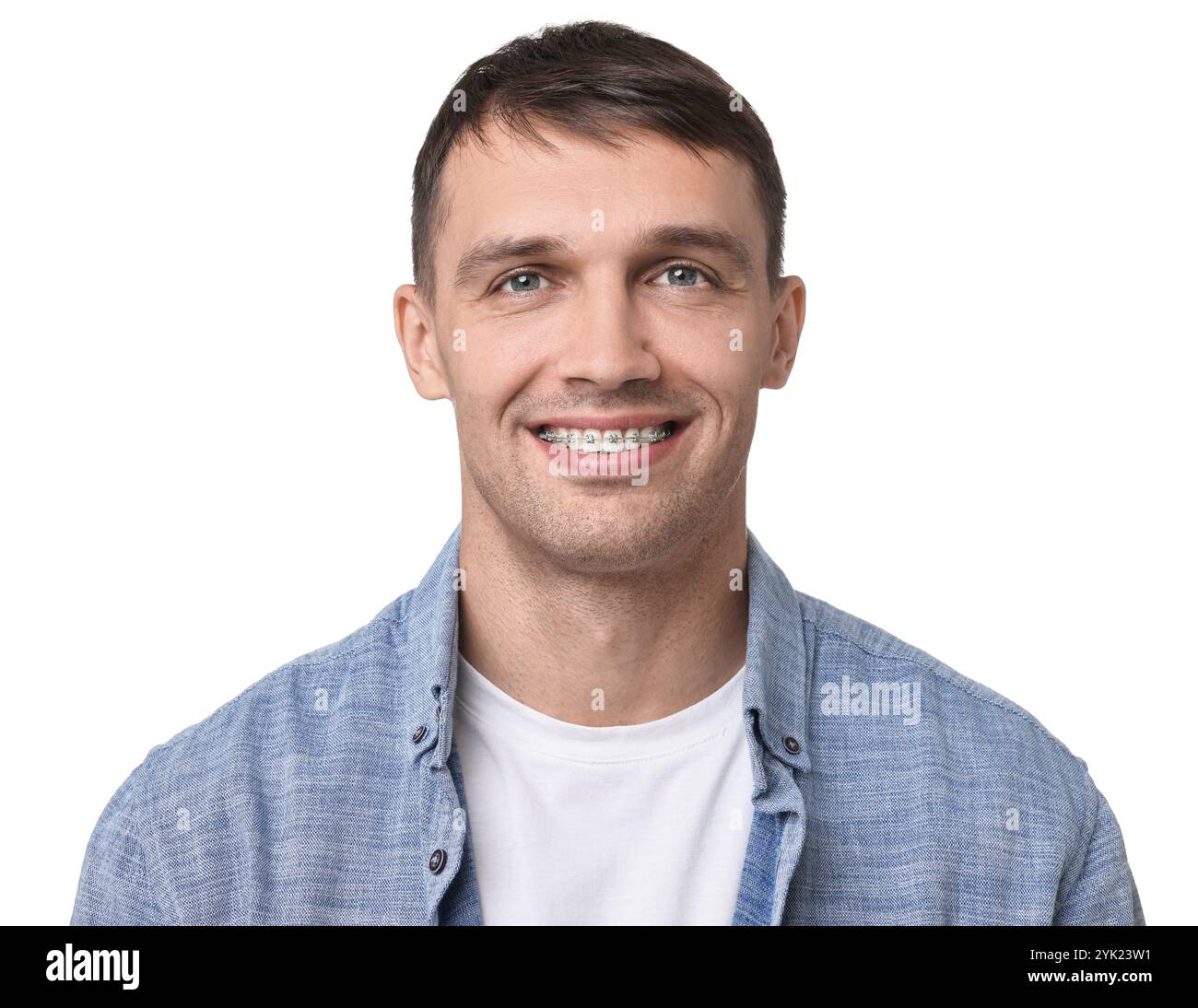 Smiling man with dental braces on white background Stock Photo - Alamy