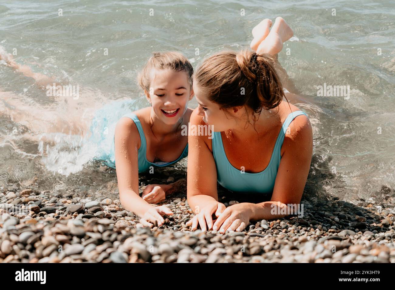 Two Young Women Enjoying a Day at the Beach Stock Photo - Alamy