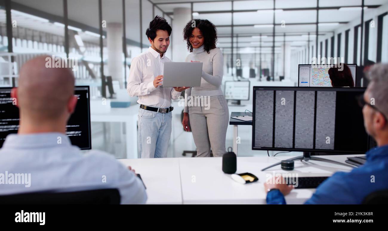 Software Engineer Developers Using Laptop Computer. Coding Startup Stock Photo