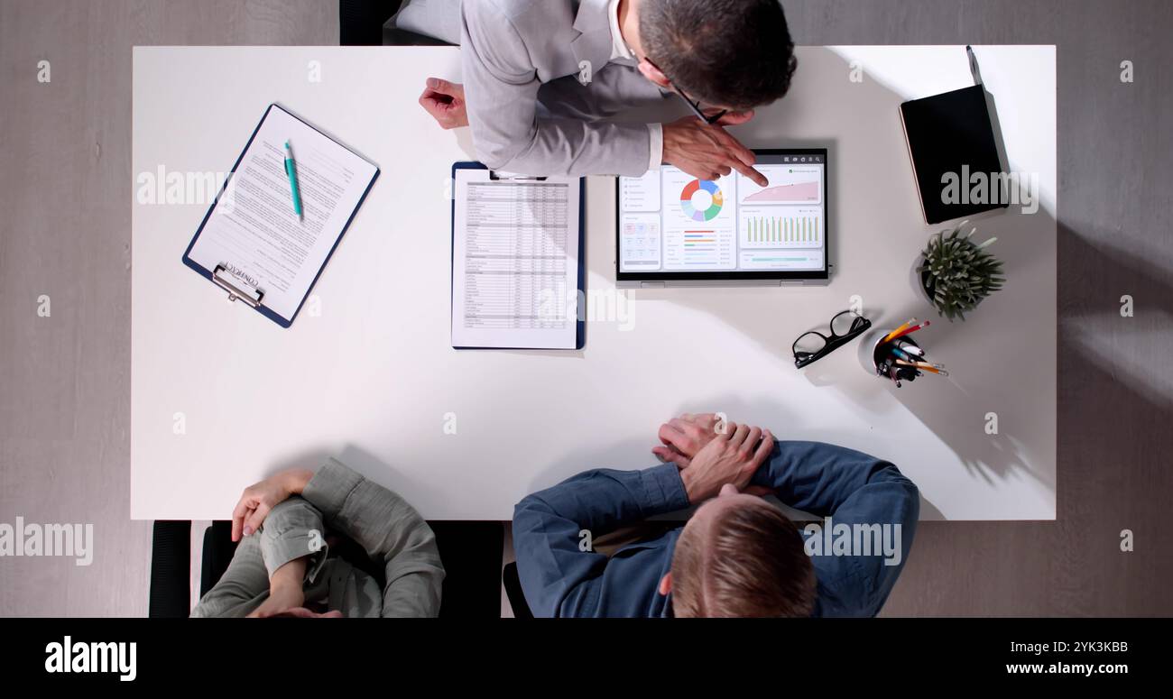 Financial Planner Giving Advice To Customer Client Stock Photo - Alamy