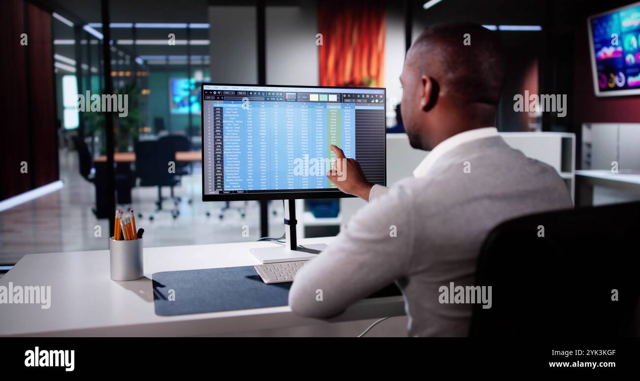 Business Data Audit Spreadsheet On Analyst Computer Stock Photo