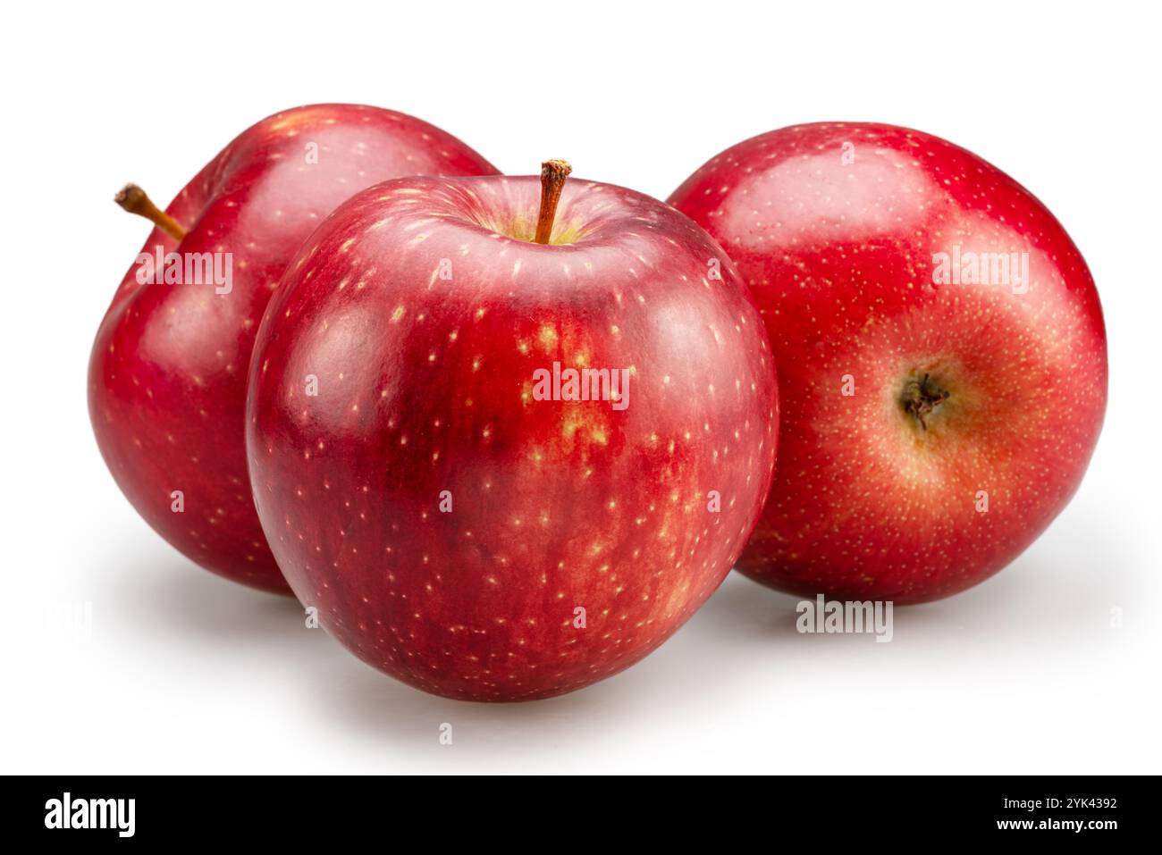 Three ripe red apples on white background. File contains clipping path. Stock Photo