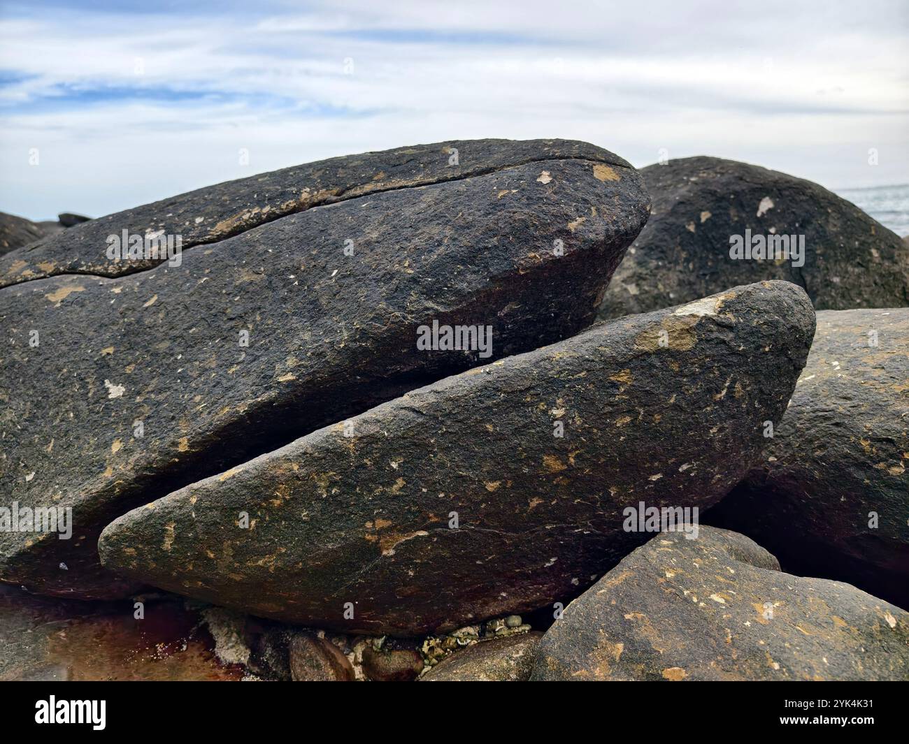 Photos Ruggged Rocks Rugged coastal rocks featuring unique beautifully textures Stock Photo ...
