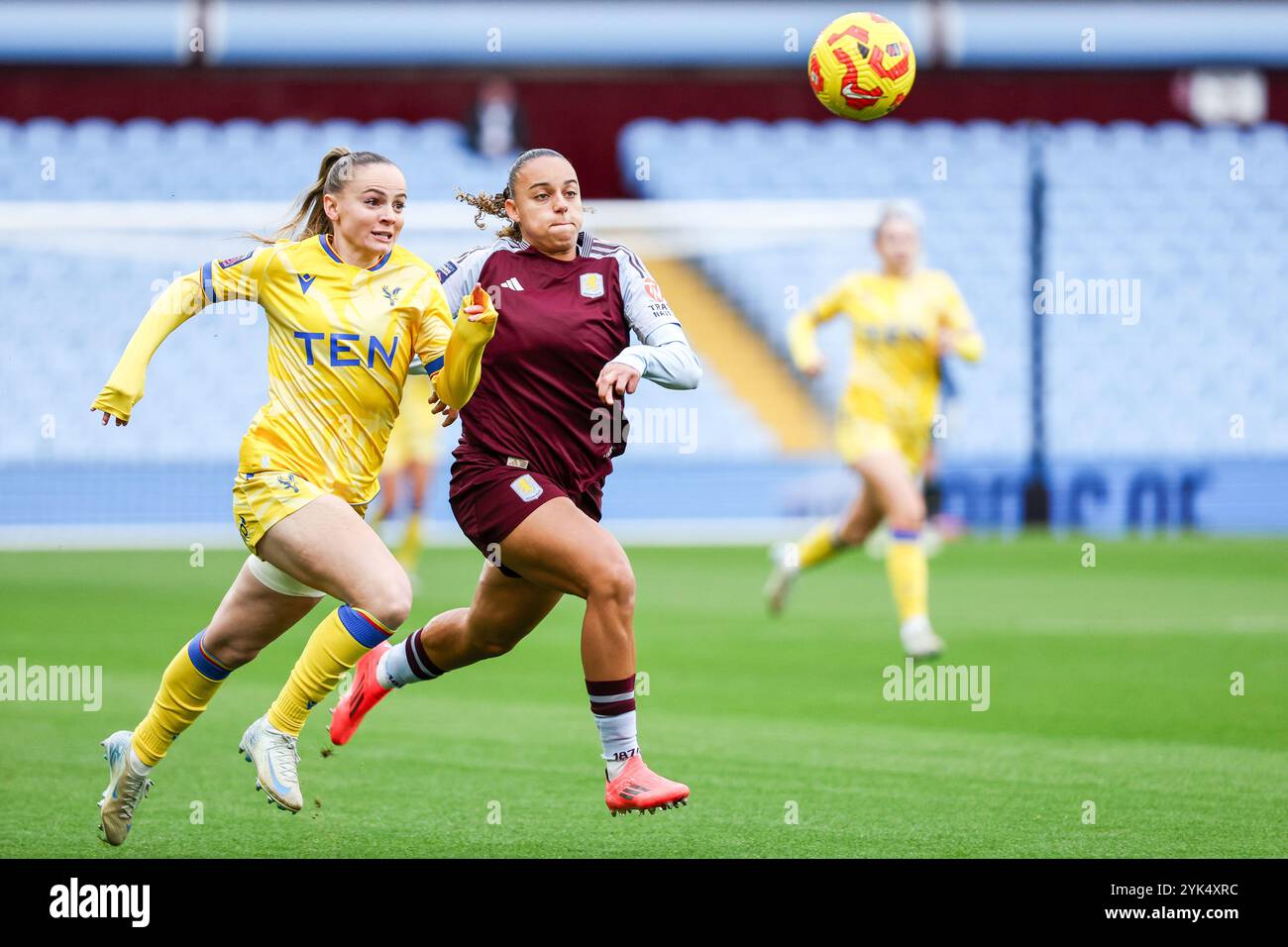 Birmingham, UK. 17th Nov, 2024. #2, Katrine Veje of Crystal Palace & #23, Chastity Grant of Aston Villa race after the ball during the Women's Super League match between Aston Villa Women and Crystal Palace Women at Villa Park, Birmingham, England on 17 November 2024. Photo by Stuart Leggett. Editorial use only, license required for commercial use. No use in betting, games or a single club/league/player publications. Credit: UK Sports Pics Ltd/Alamy Live News Stock Photo