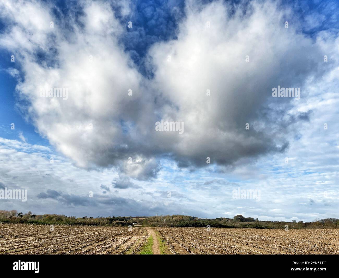 Low cumulus clouds over farmland near Ancaster, Lincolnshire, England. - Smartphone Captured Stock Image