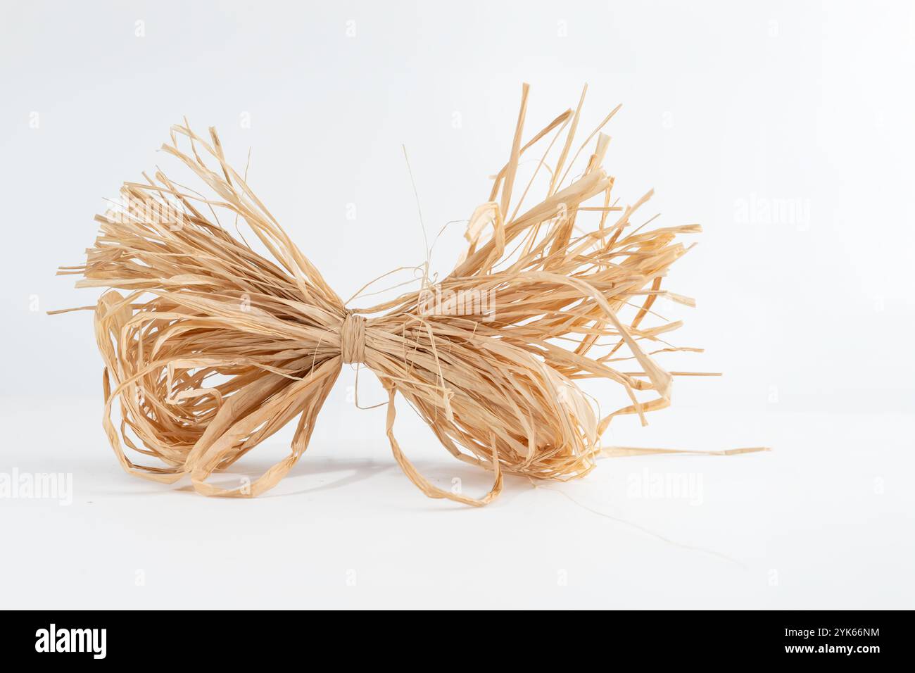 natural straw sheaf decorative bow isolated on a white background Stock ...