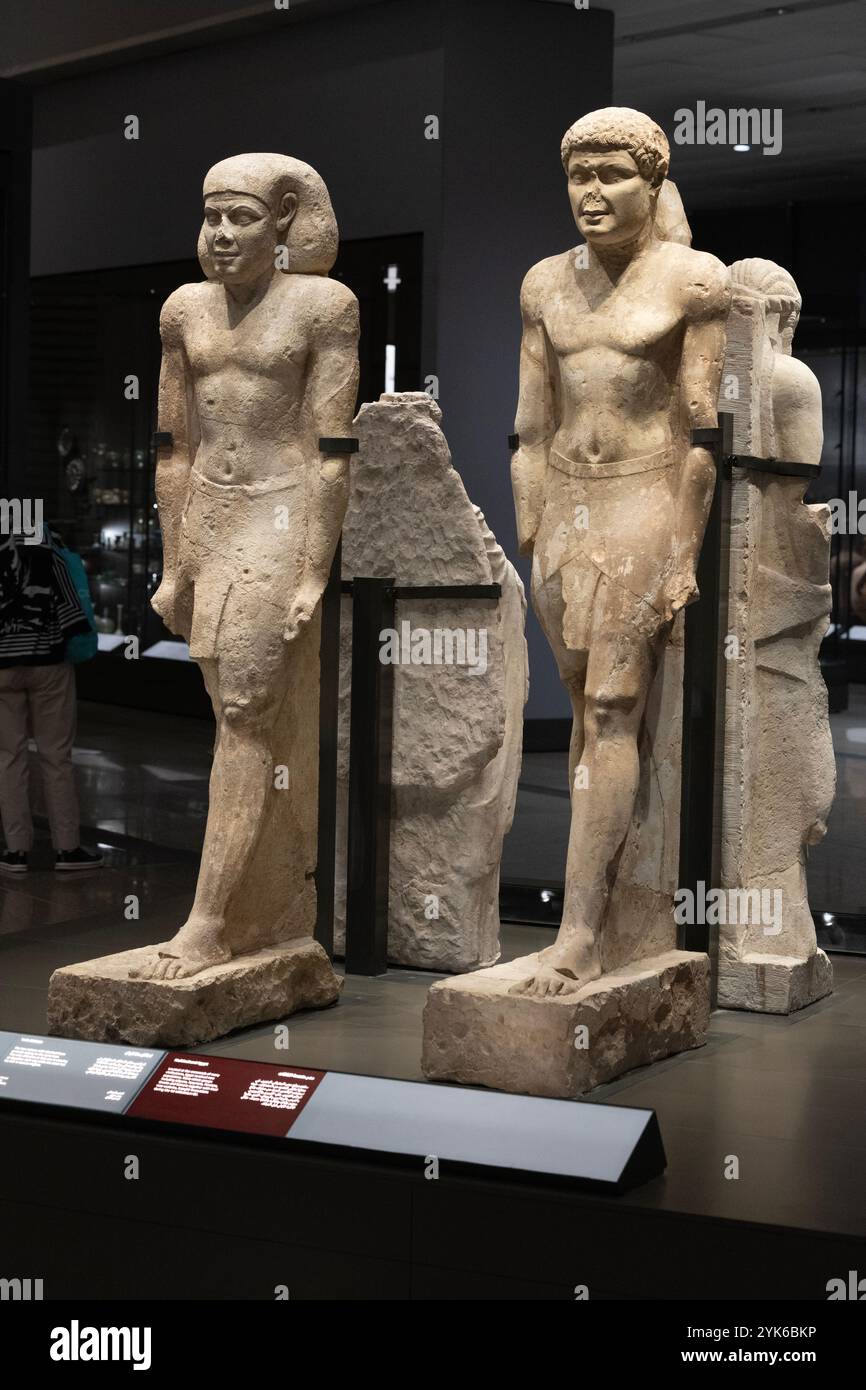 Limestone Statue Example Twin limestone statues, possibly of the same unknown person, in gallery ...