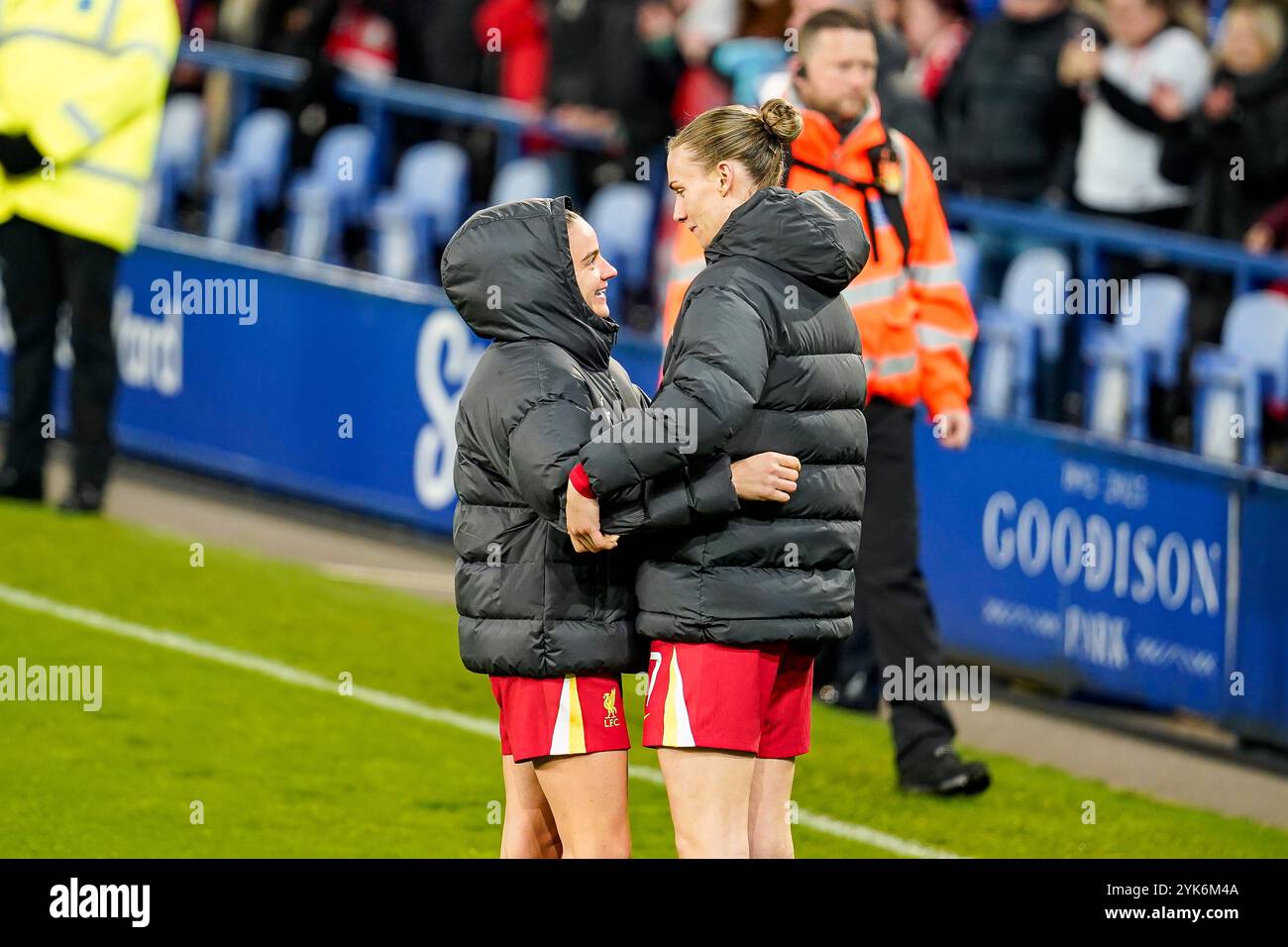 Goodison Park, Liverpool, UK. Sunday 17th November 2024, Barclays Women’s Super League: Everton FC Women Vs Liverpool FC Women at Goodison Park. Liverpool Defender Jenna Clark 17 & Liverpool Forward Leanne Kiernan 9 hug and smile at full time. Credit James Giblin/Alamy Live News. Stock Photo