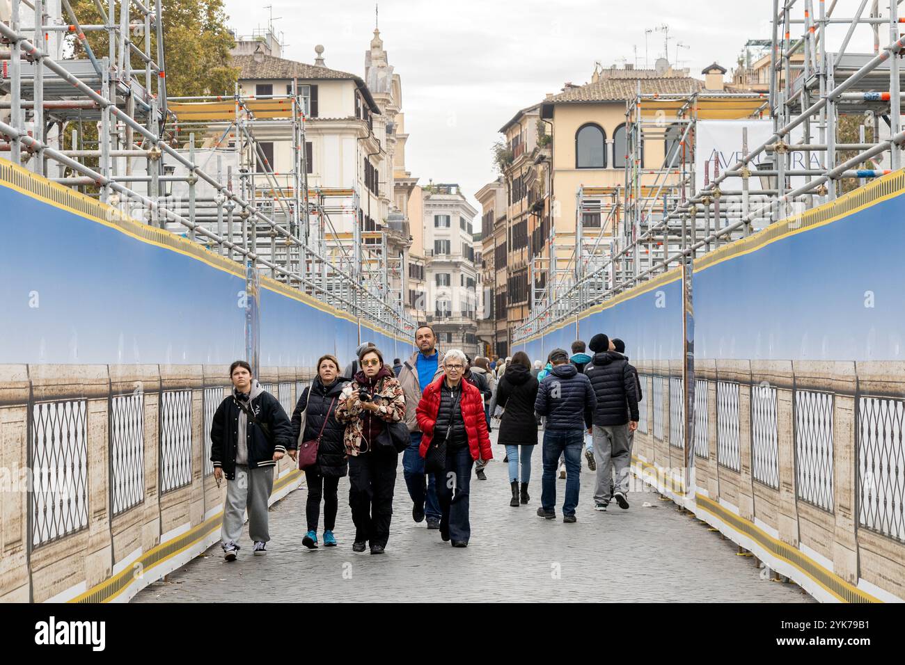 Rome, Italy - Nov 14, 2024: Pedestrians walk through Ponte Sant'Angelo ...
