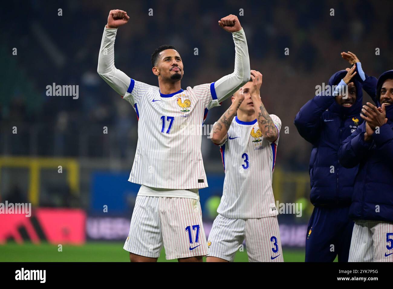 William Saliba (Arsenal)of France celebrates with teammates at the end of the UEFA Nations League football match between Italy and France at the San Siro Stadium in Milan, Italy on November 17, 2024 Credit: Piero Cruciatti/Alamy Live News Stock Photo