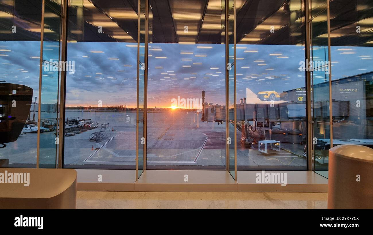 A breathtaking view of the sunrise at Charles de Gaulle Airport in Paris, France. - Smartphone Captured Stock Image