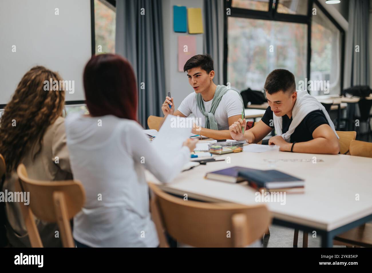 Group teenagers classroom project hi-res stock photography and images ...