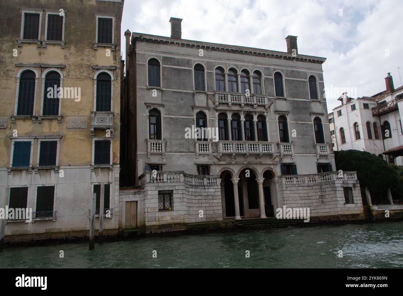 A view of historic Venetian buildings along the Grand Canal, showcasing ...