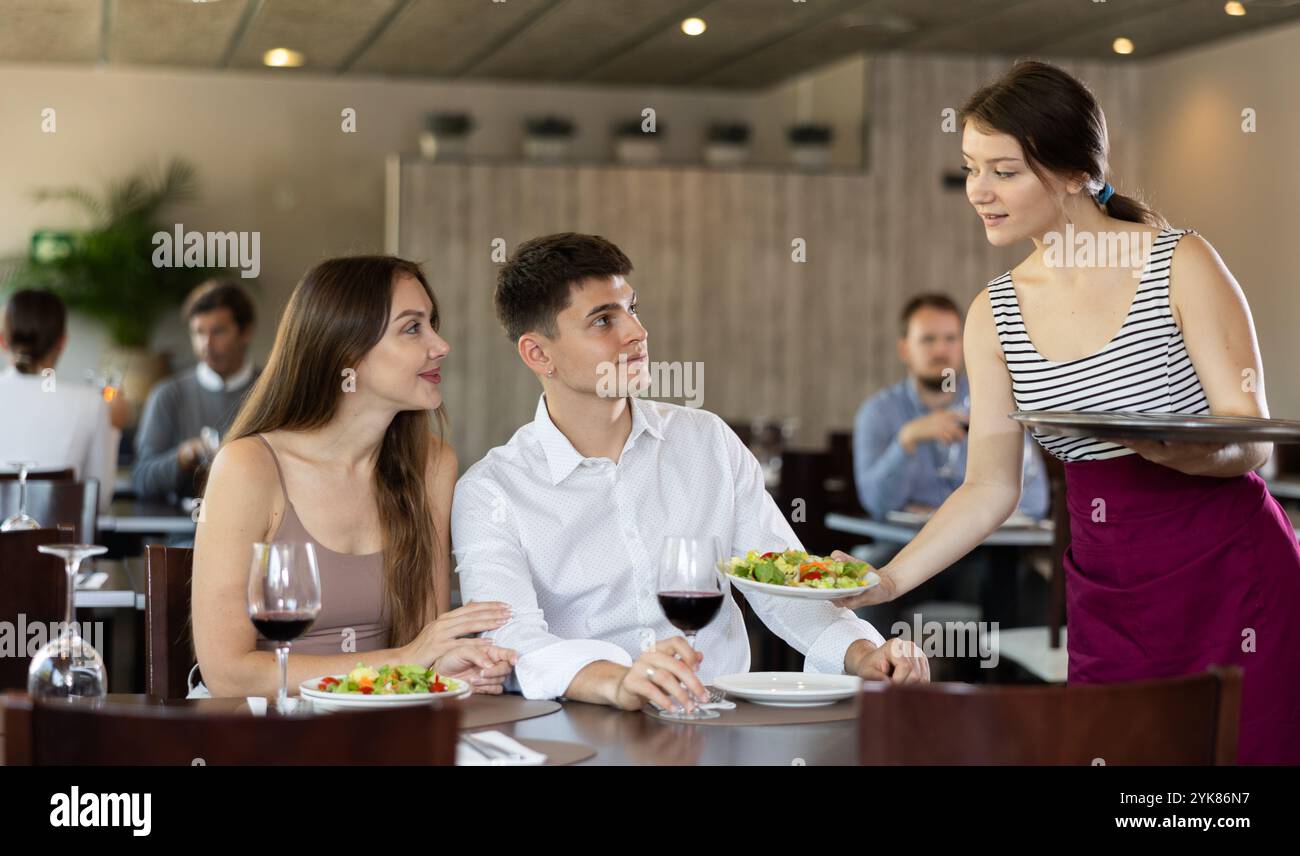 Waitressing Man Waiter brings drink order hi-res stock photography and images - Alamy