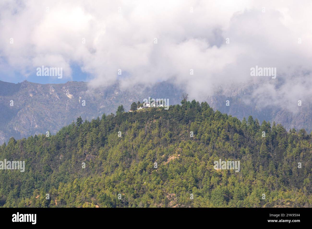 Traditional Bhutanese building complex nestled on a hillside, Paro, Bhutan. Stock Photo