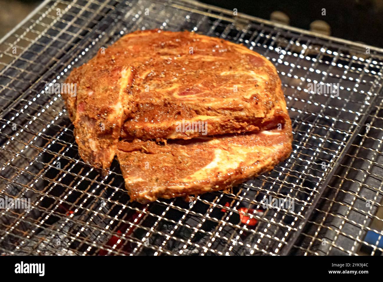 Meat on a barbecue charcoal grill Stock Photo - Alamy