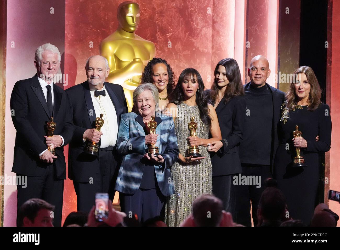 Richard Curtis, from left, Michael G. Wilson, Juliet Taylor, Martina