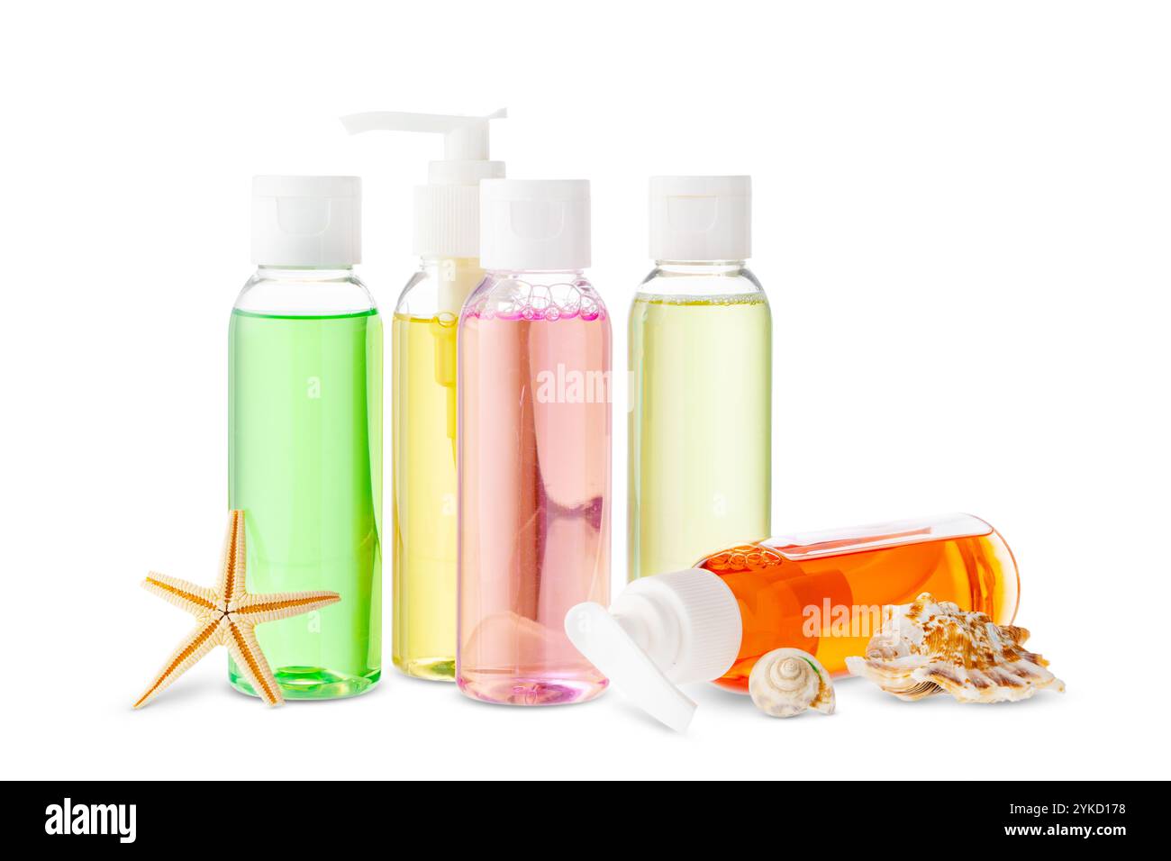 Assorted skincare products displayed on a white surface with a seashell Stock Photo