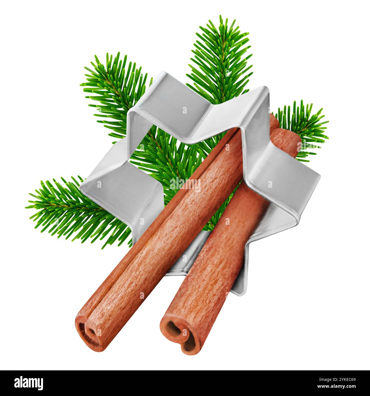 Cinnamon sticks and baking cookie form isolated on white background Stock Photo