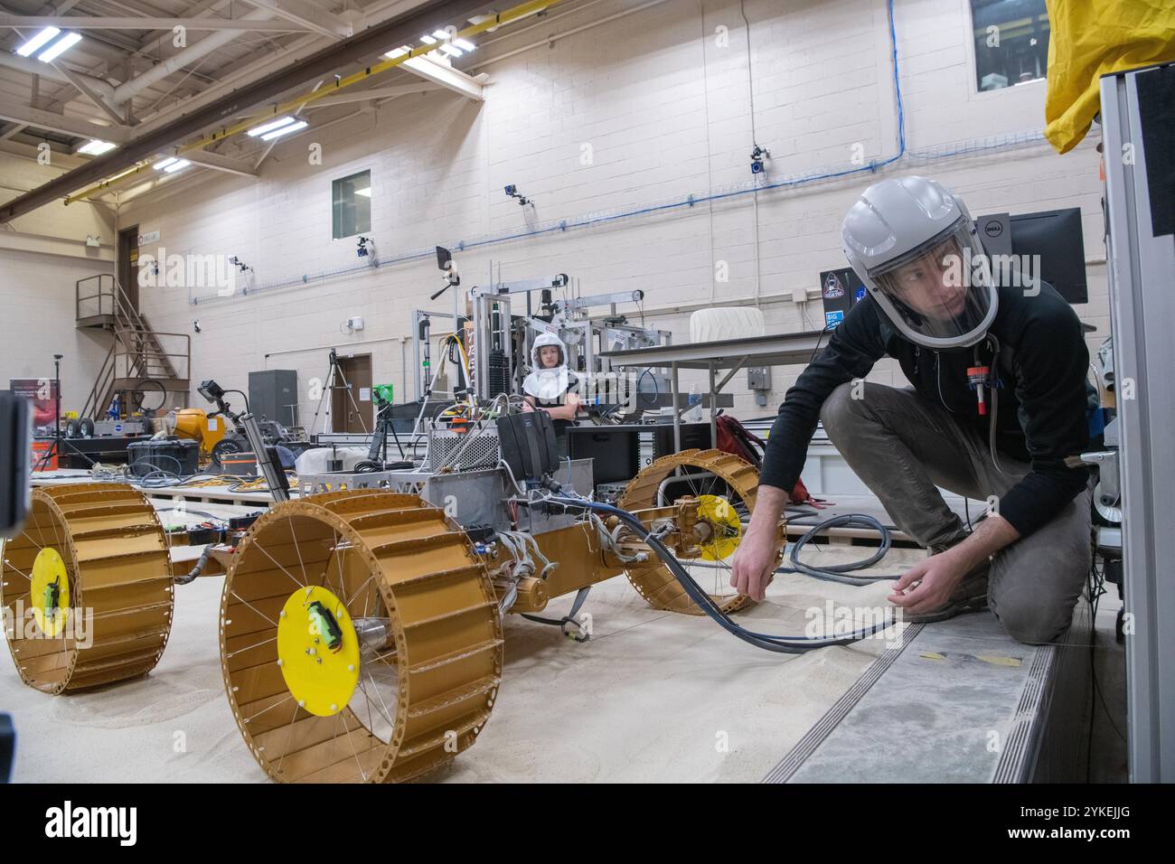 Technicians work on the Volatiles Investigating Polar Exploration Rover (Viper) on 11 March 2021. VIPER (Volatiles Investigating Polar Exploration Rover) was a lunar rover which was developed at the NASA Ames Research Center. Before the project was cancelled in 2024 the rover would have been tasked with prospecting for lunar resources in permanently shadowed areas of lunar south pole region, especially by mapping the distribution and concentration of water ice. The mission built on a previous NASA rover concept, the Resource Prospector, which had been cancelled in 2018. (wikipedia) Stock Photo