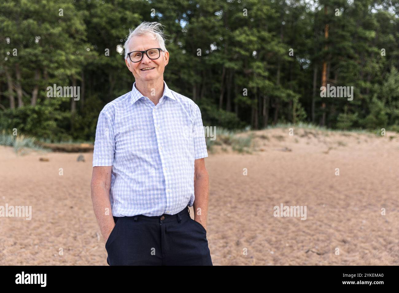 Older man walking on beach hi-res stock photography and images - Alamy