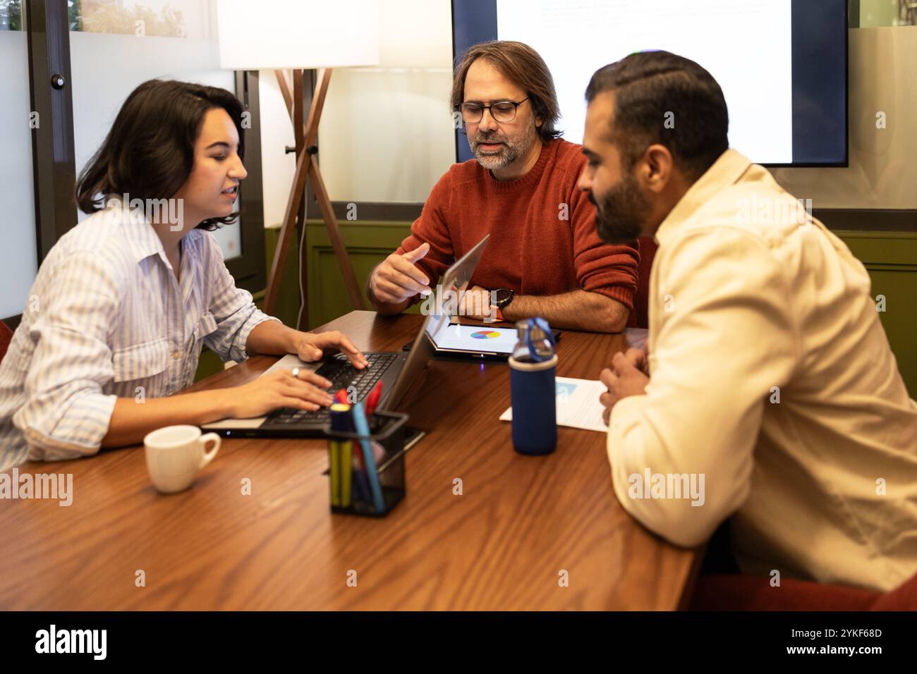 A diverse group of professionals engaged in a creative brainstorming ...
