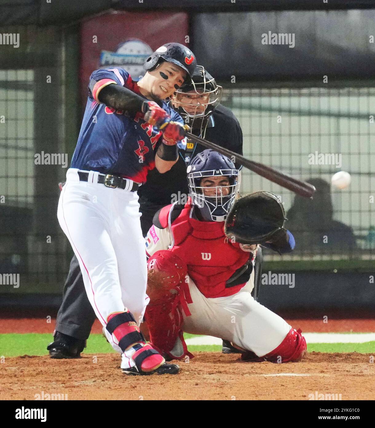 Ryoya Kurihara of Japan hits a run-scoring timely hit in the 5th inning ...