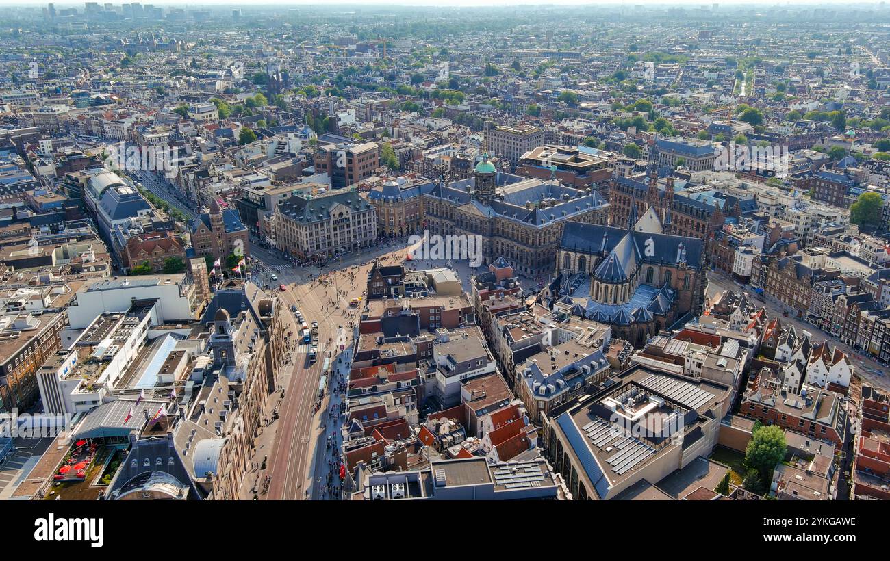 Stunning aerial view of Amsterdam's historic center, showcasing iconic architecture, bustling squares, and intricate canals. Stock Photo