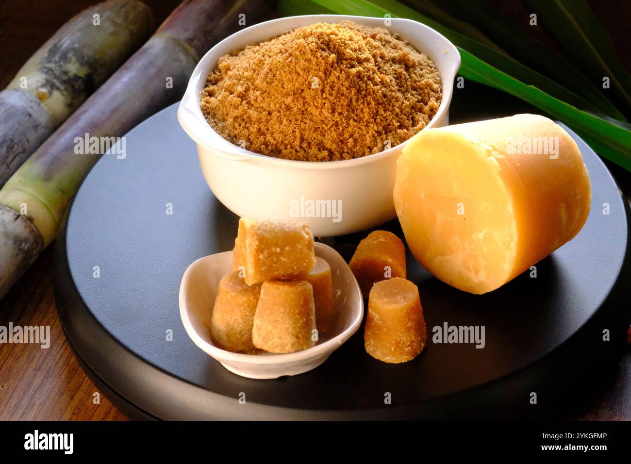 Jaggery powder with jaggery cubes. Jaggery is used as an ingredient in ...