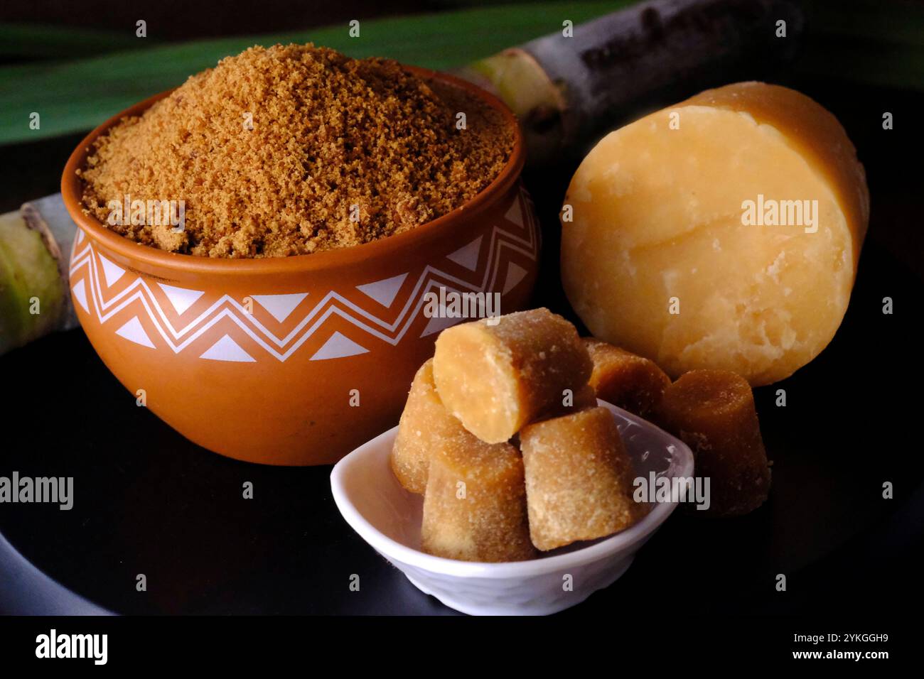 Jaggery powder with jaggery cubes. Jaggery is used as an ingredient in ...