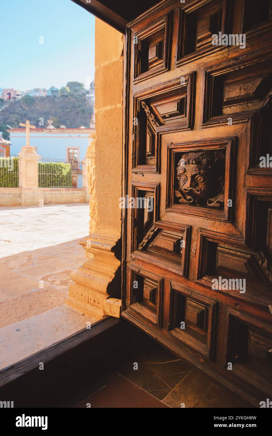 An intricately carved wooden door at the Basílica Colegiata de Nuestra ...