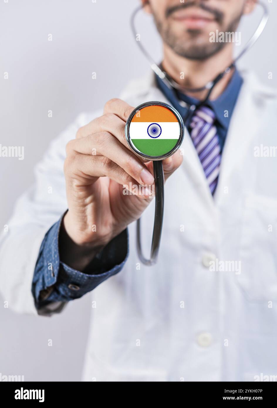 India health and medical insurance concept. Healthcare System India, doctor holding stethoscope Stock Photo