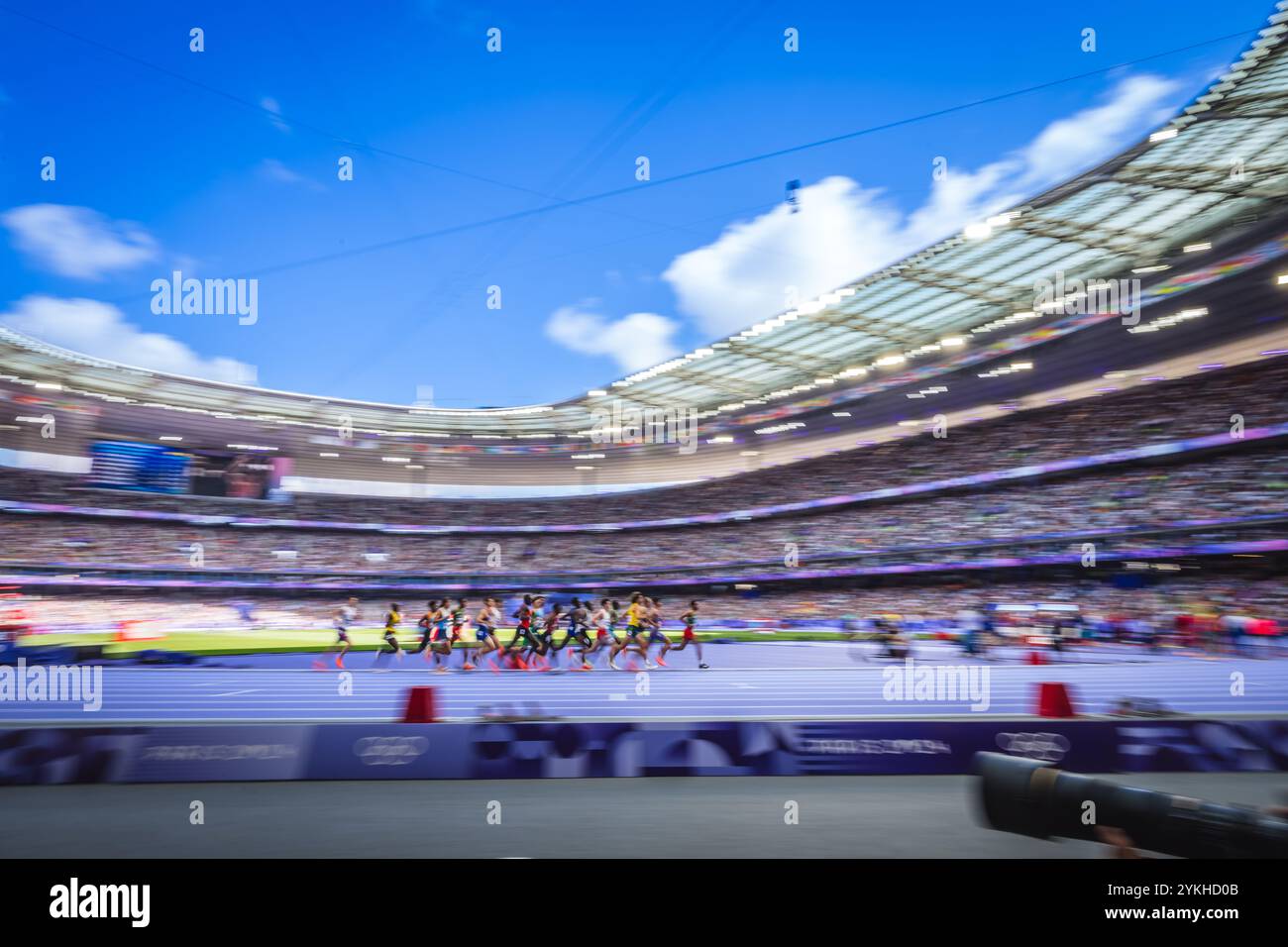 Image of Runners in motion in the 5000 meters at the Paris 2024 Olympic ...