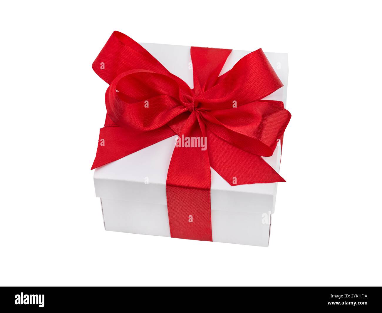 One white gift box with red bow from satin ribbon on white isolated ...