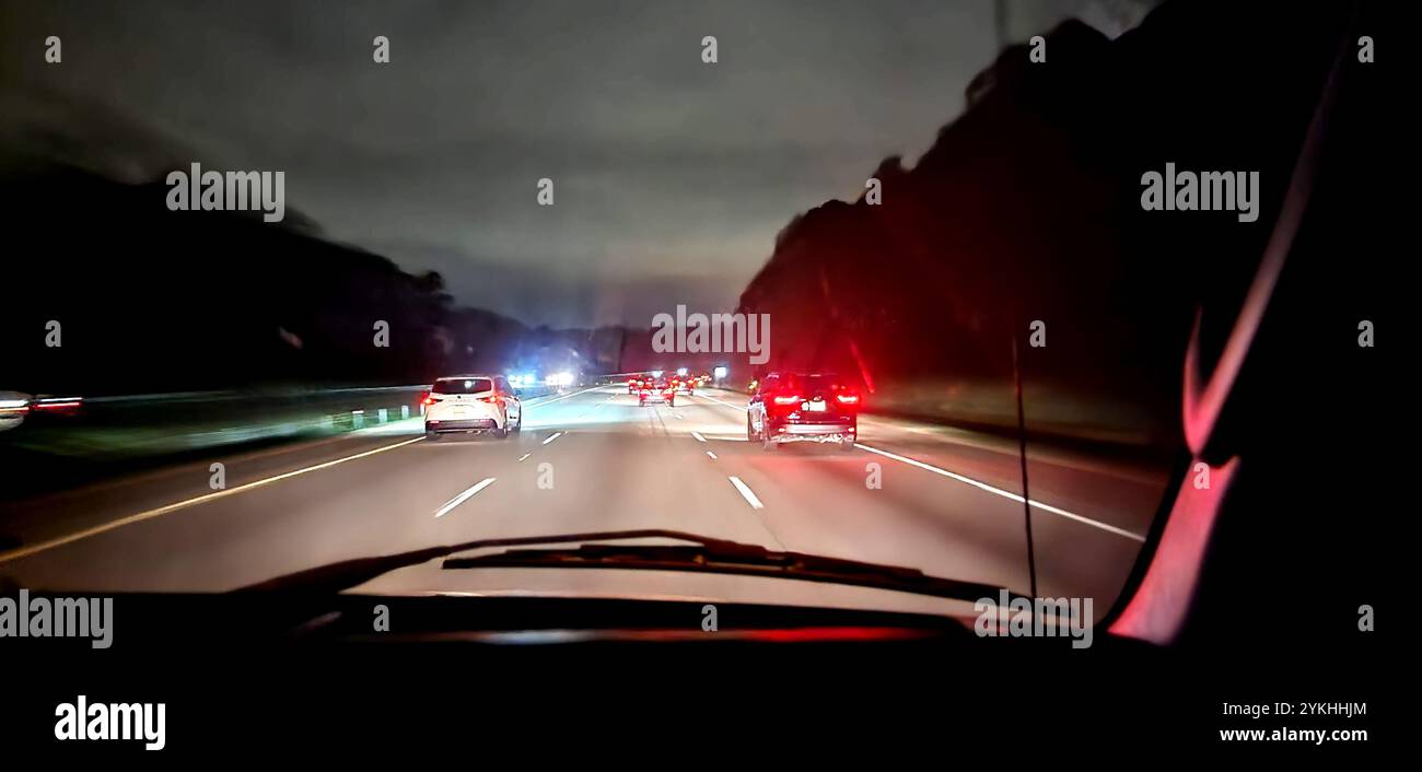 Nighttime driving on a highway Stock Photo