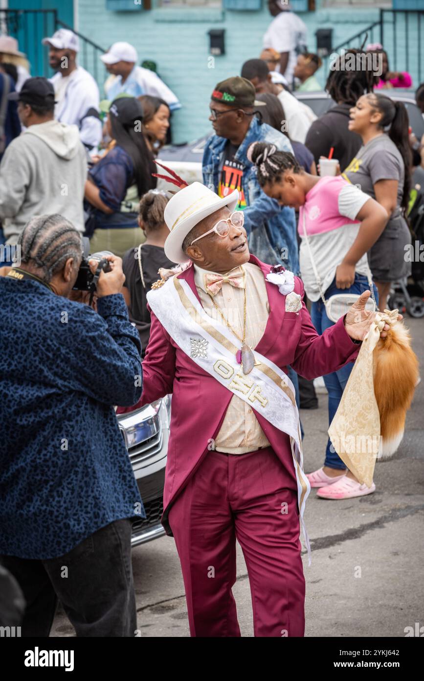 Musicians and community groups gather before a Second Line parade through the streets of Treme, New Orleans, Louisiana. Stock Photo