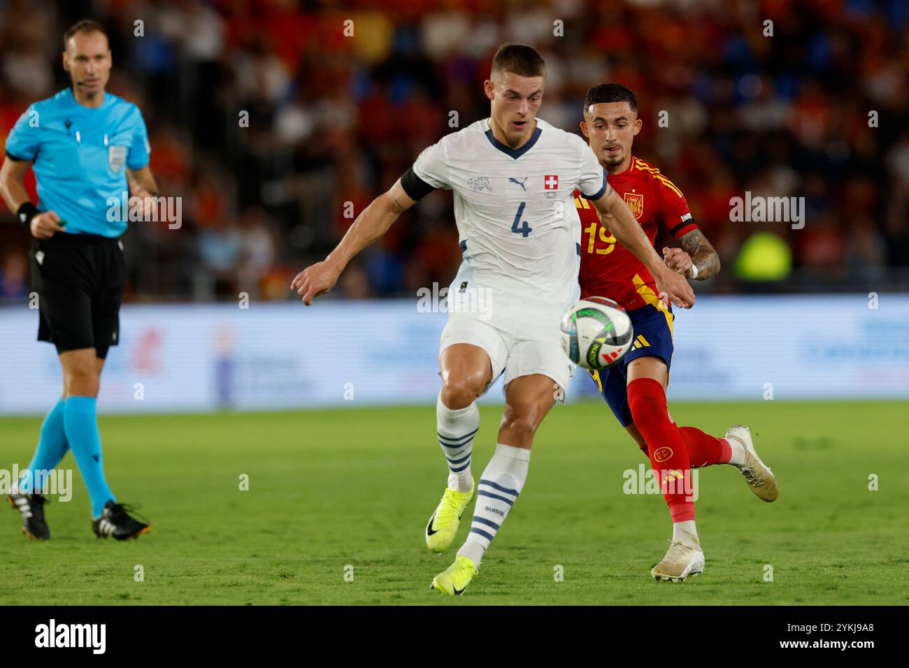 Switzerland's Miro Muheim fights for the ball against Spain's Yeremy ...