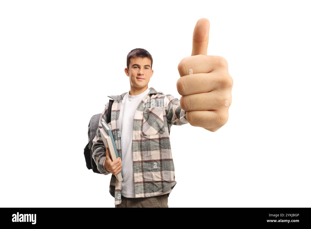 Male student with backpack and books standing and showing thumbs up ...