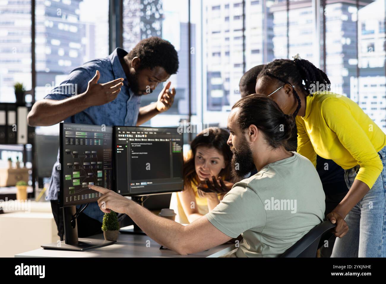 Coworkers doing brainstorming, conducting experiments and tests to optimize machine learning models for performance and accuracy. Colleagues gathered in office to analyze complex AI data Stock Photo