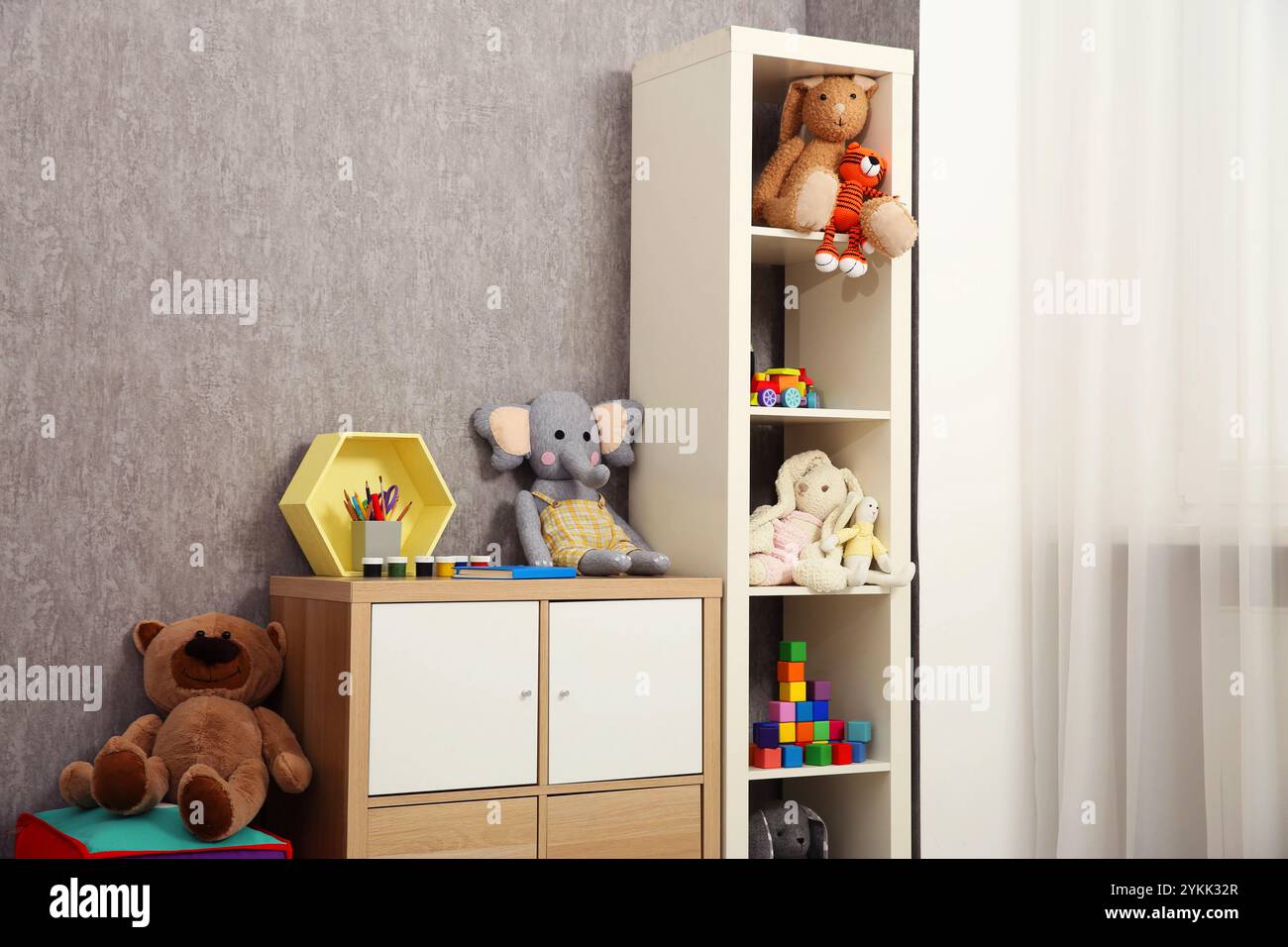 Beautiful kid's room interior with toys and stylish furniture Stock ...