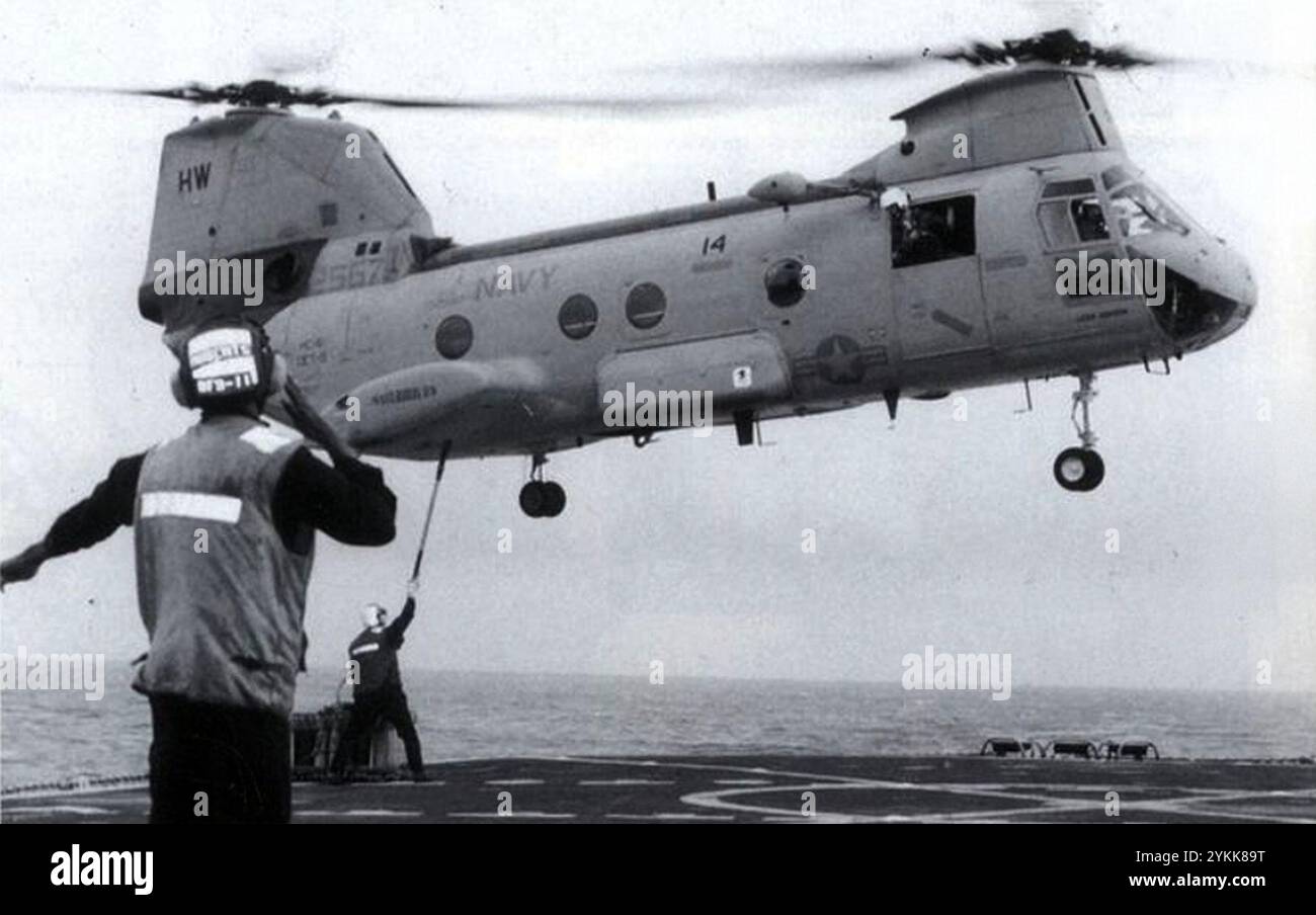 Boeing Vertol CH-46D Sea Knight of HC-6 hovers over USS Santa Barbara ...