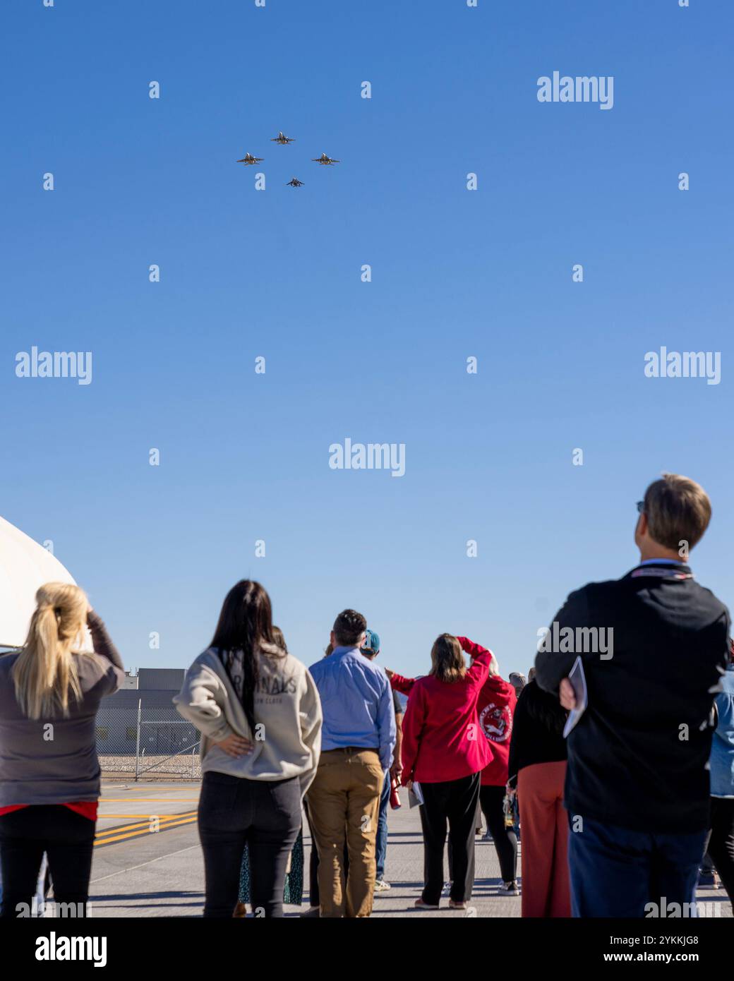 Aircraft form Air Test and Evaluation Squadron (VX) 31 conduct a flyover during a ribbon-cutting ceremony for the South Airfield Complex at Naval Air Weapons Station China Lake, California, on Nov. 7. The complex includes the squadron’s new hangar. (U.S. Navy photo by Ryan Smith) Stock Photo